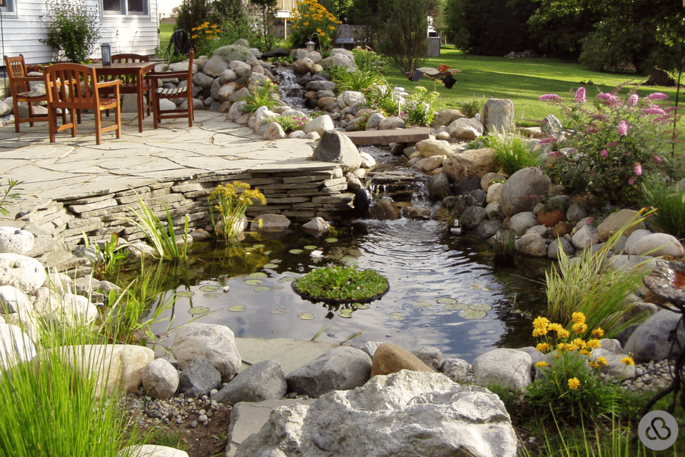 top water features to install for your outdoor living space backyard pond custom built michigan