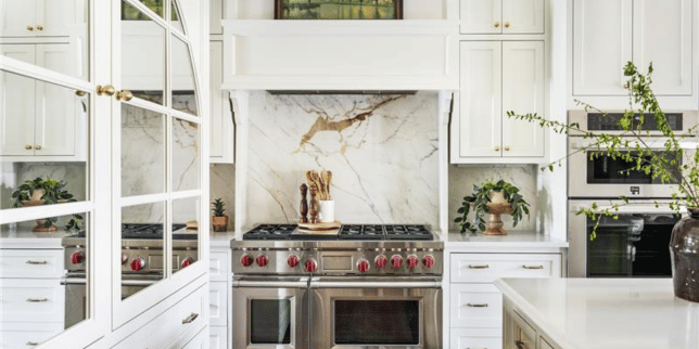 the pros and cons of slab kitchen backsplashes quartz countertop backsplash with marble veining and large range custom built michigan