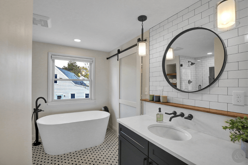 factors that affect the cost of bathroom remodels tub with barn door and vanity custom built michigan