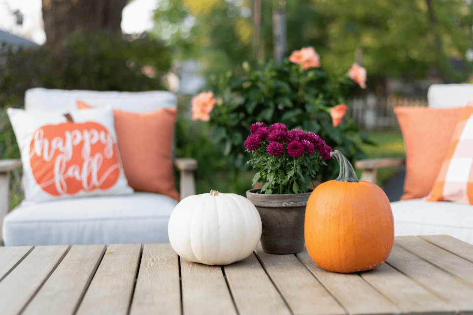 top 10 ways to prepare your outdoor living space for fall in michigan pumpkin and pillow decor custom built