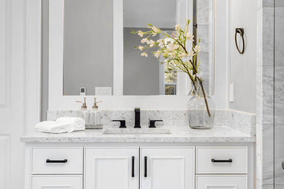 comparing bathroom remodeling sink vanity ideas white cabinets with mirror custom built michigan