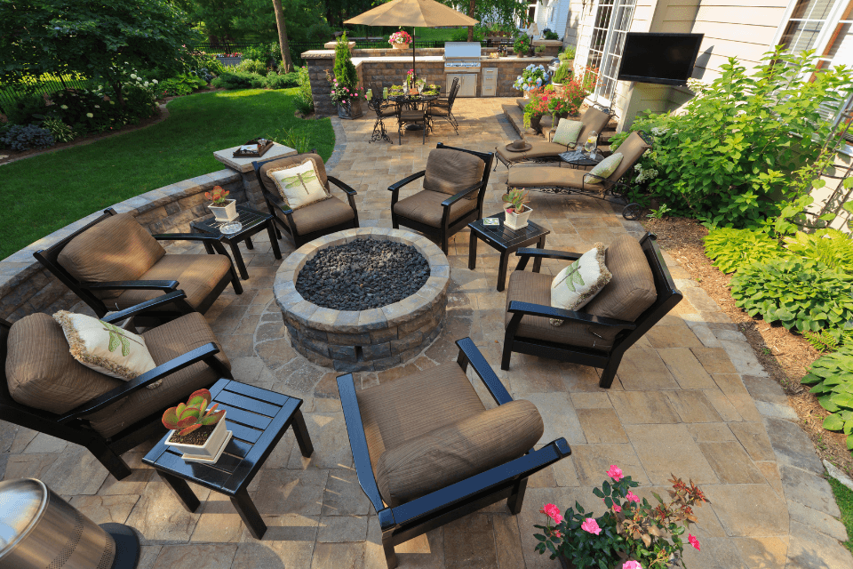 comparing patio designs for your michigan home fire pit with outdoor furniture custom built okemos