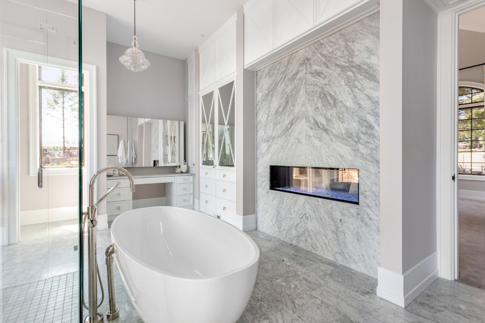 hidden bathroom remodel costs to keep in mind freestanding tub with wall fireplace custom built michigan