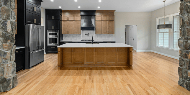 signs that you need a flooring replacement luxury kitchen with hardwood floor custom built michigan