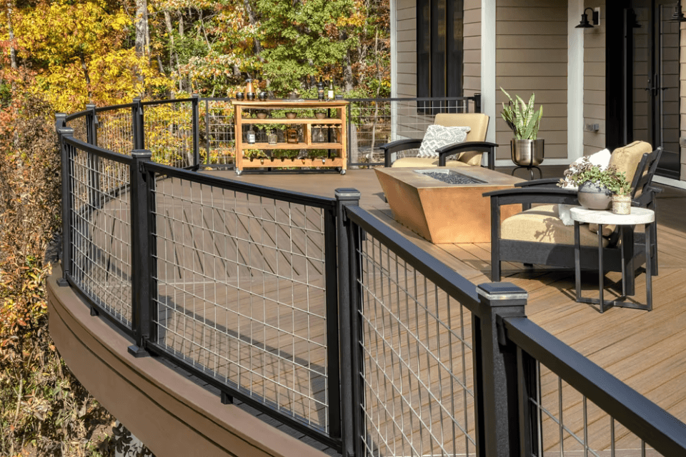 common issues with resurfacing your deck outdoor living space with bar and railing custom built michigan