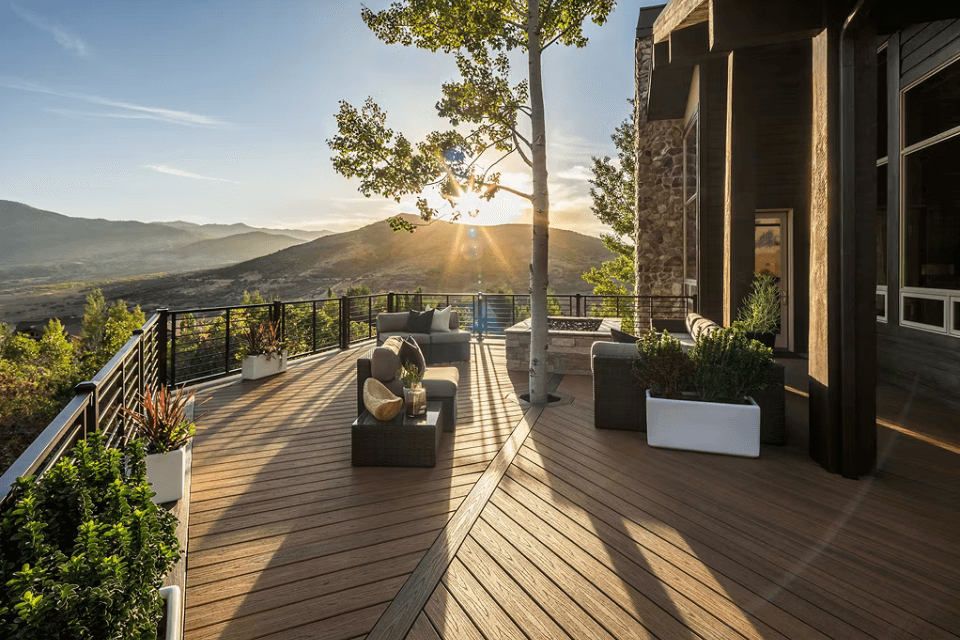 environmental benefits of choosing trex composite decking outdoor living space with railing and furniture custom built michigan