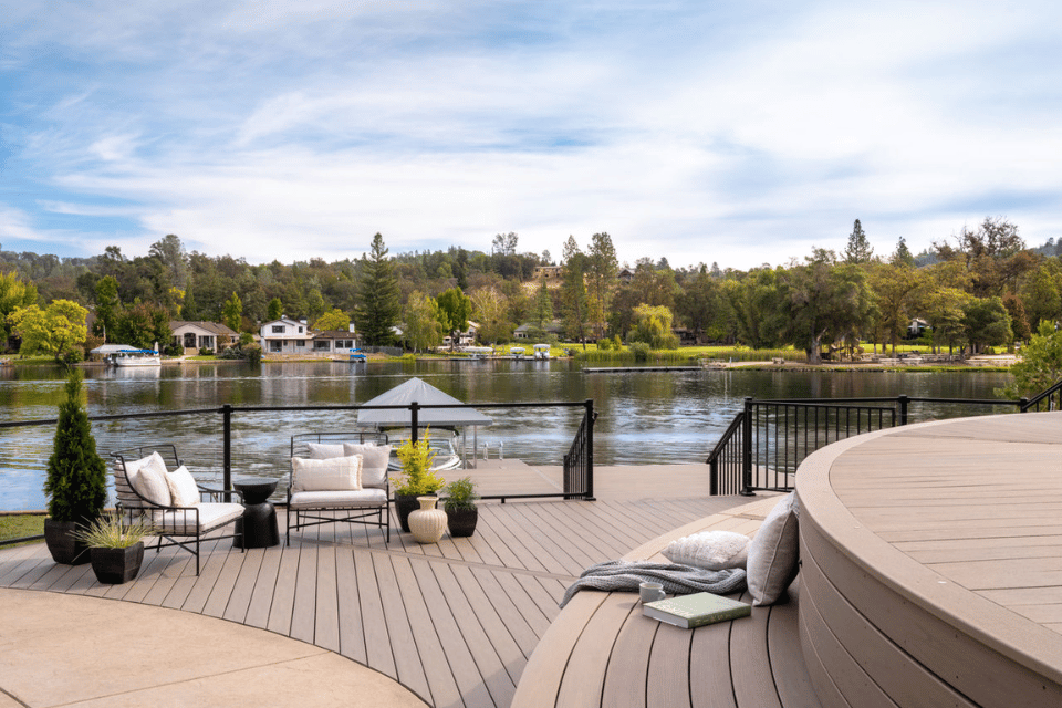 reasons to build a composite deck for your lake home waterfront outdoor living space with furniture custom built michigan