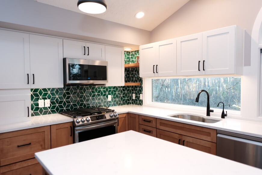 Kitchen with white quartz countertop and green mosaic backsplash